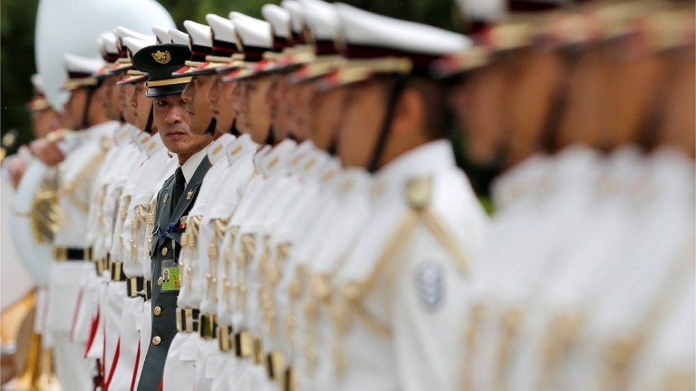Line of soldiers in Japan's Self-Defence force at a ceremony for Prime Minister Shinzo Abe at the Defense Ministry in Tokyo, Japan, September 11,