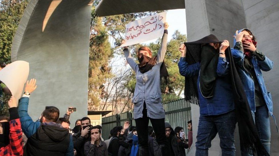 Iranian students clash with riot police during an anti-government protest around the University of Tehran, Iran, 30 December 2017.