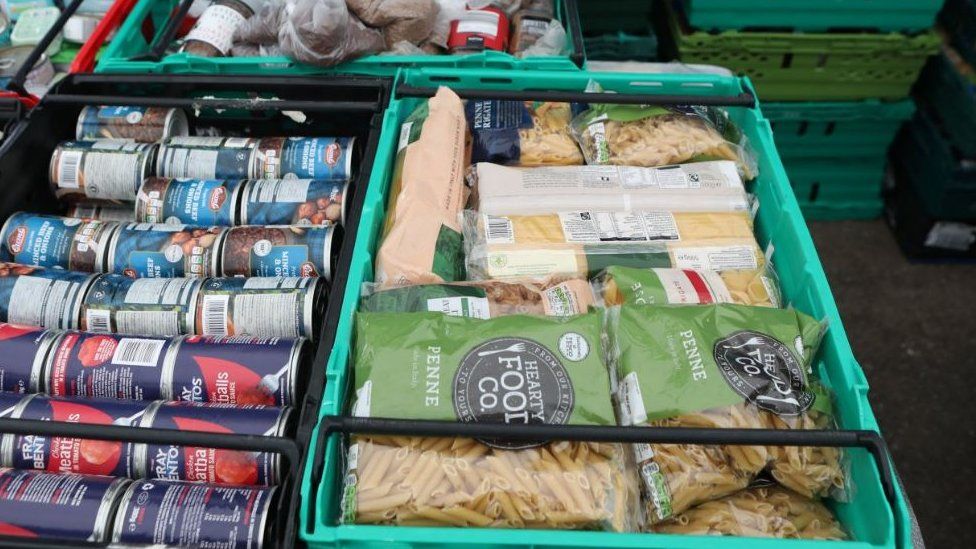 Food laid out in crates at a food bank