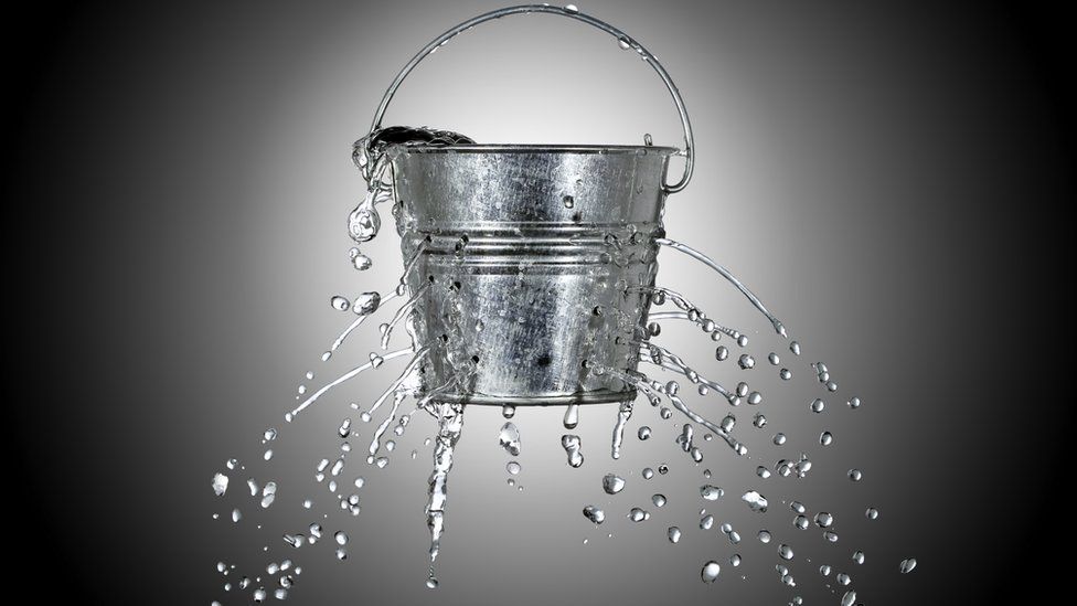 Metal bucket leaking water