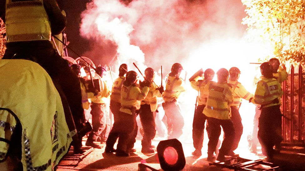 Police clash with Legia Warszawa fans outside the stadium before the UEFA Europa Conference League match between Aston Villa and Legia Warszawa at Villa Park on November 30, 2023 in Birmingham, England