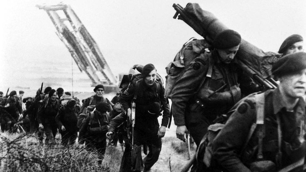 British Royal Marine commandos moving off the Normandy beaches during the advance inland from Sword Beach