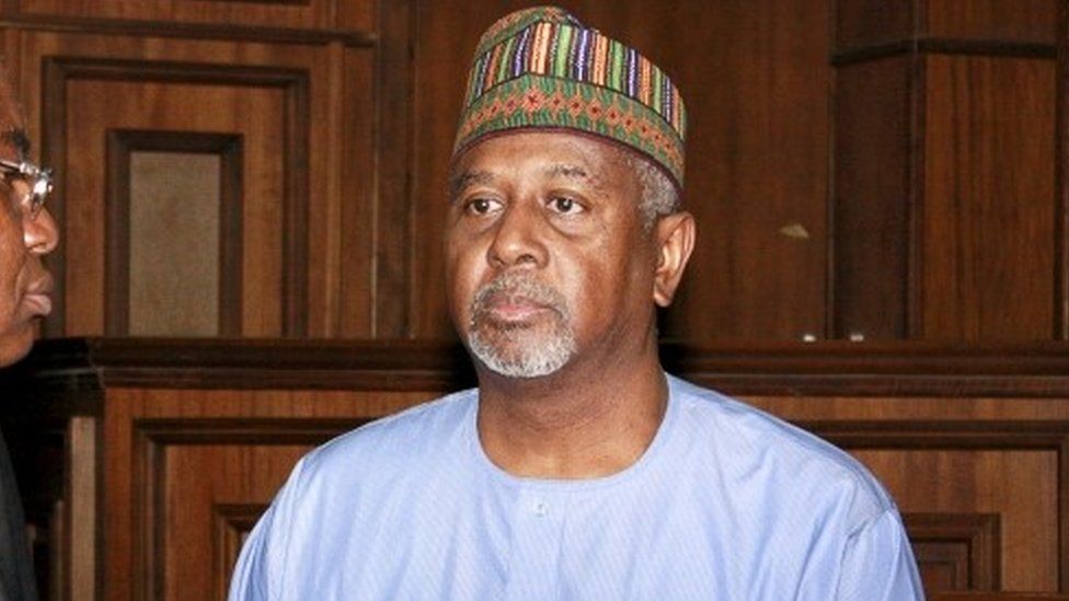 Former National Security Adviser Sambo Dasuki (R) arrives with one of his counsels Ahmed Raji at the Federal High Court in Abuja, Nigeria, September 1, 2015