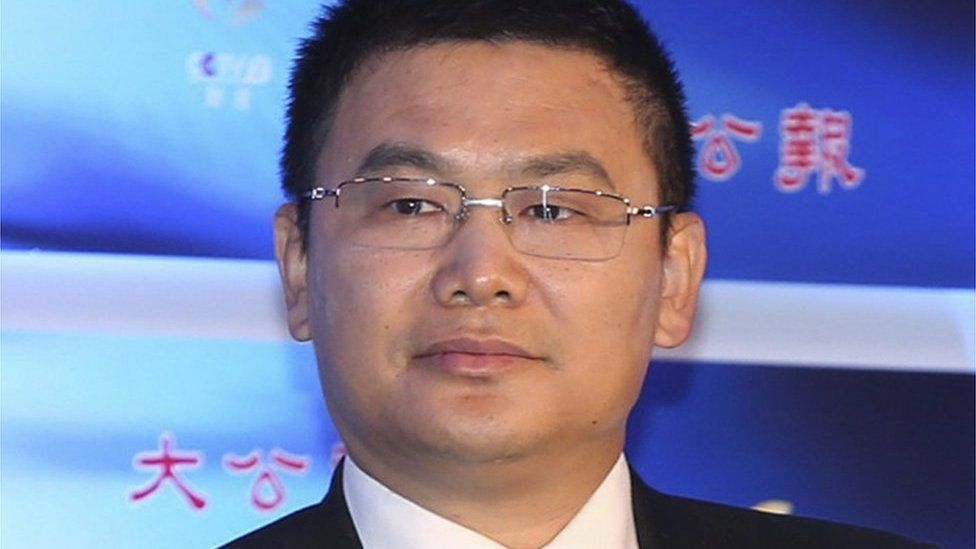 In this 4 November 2015 photo, Yim Fung, chairman and chief executive of Guotai Junan International Holdings Ltd., the Hong Kong unit of a Chinese securities company, attends an event in Hong Kong.