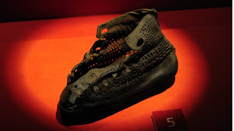 A baby's shoe, which was preserved for about 2,000 years in peat soil