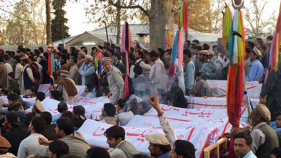 Pakistani mourners gather around the coffins of blast victims during a protest following a powerful bomb explosion at a market in Parachinar, the capital of the Kurram tribal district, on 31 March 2017
