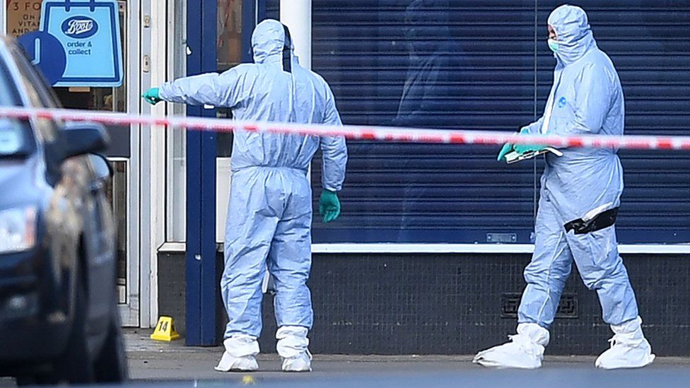 Forensic officers at the scene of the attack on Streatham High Road in south London