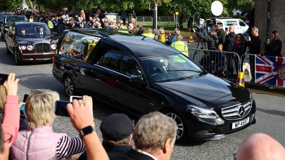 The Queen's funeral cortege is observed