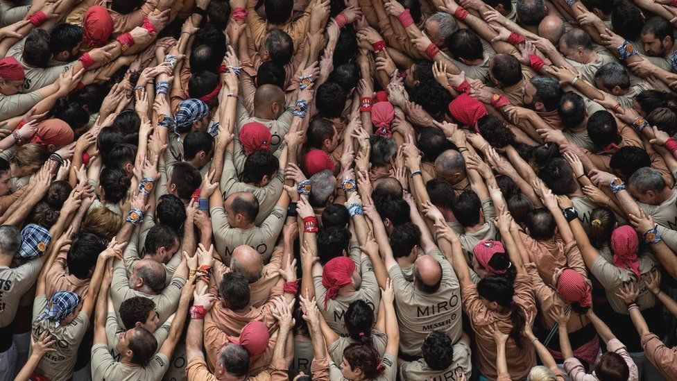 "Castellers" build a human tower