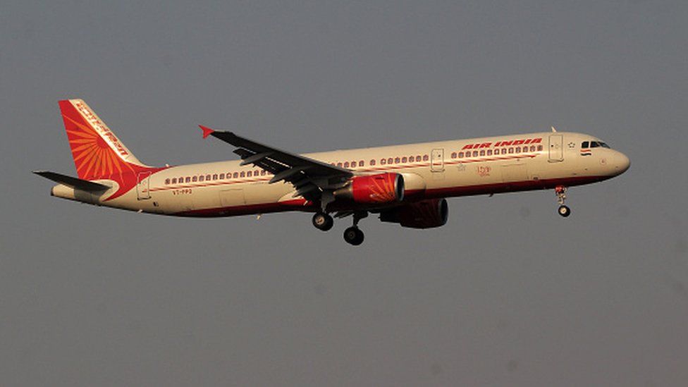 An Air India passenger flight prepares for landing to the Biju Patnaik International Airport in the eastern Indian state odisha's capital city Bhubaneswar (Photo by STR/NurPhoto via Getty Images)