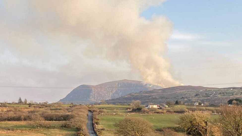 Fire on Mynydd Tal y Mignedd, photographed from Caernarfon