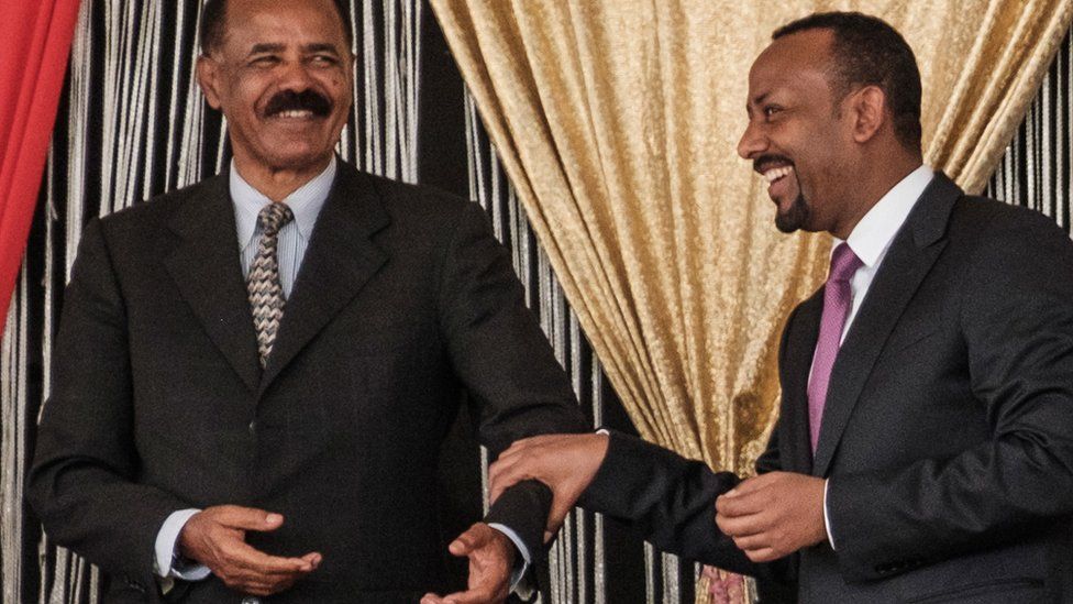 Eritrea's President Isaias Afwerki and Ethiopia's Prime Minister Abiy Ahmed smiling