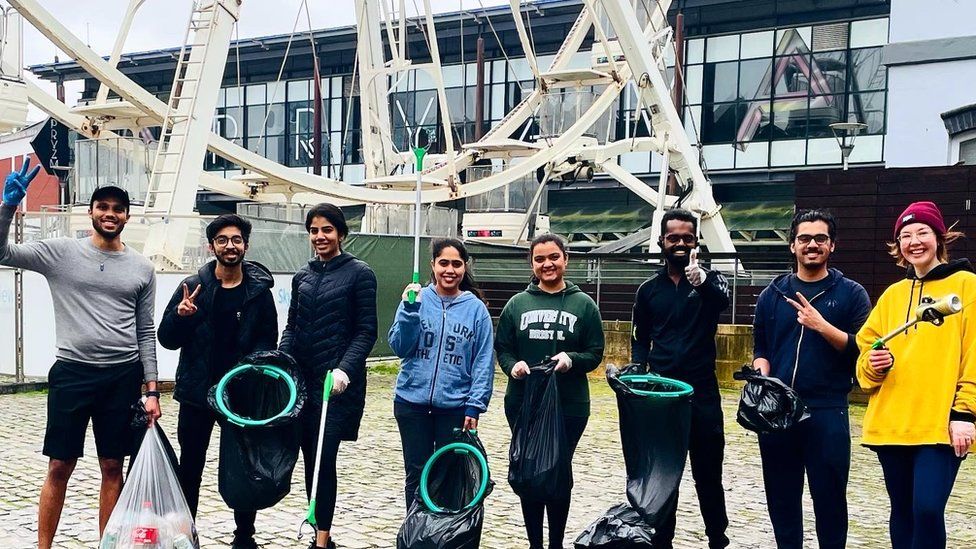 Mr Gurav and others collecting litter in Bristol