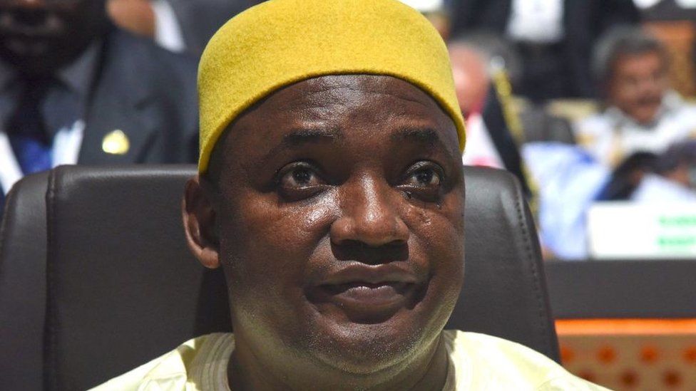 Adama Barrow looks on during the African Union summit at the palais des Congres in Niamey, on July 7, 2019