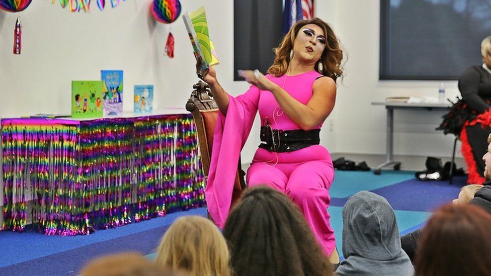 Drag Queen Princess Mocha reading to children