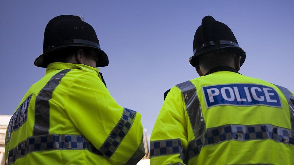 Stock image of two UK police officers