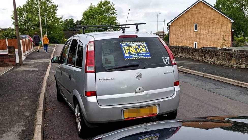 A silver Vauxhall Meriva that has been seized by police