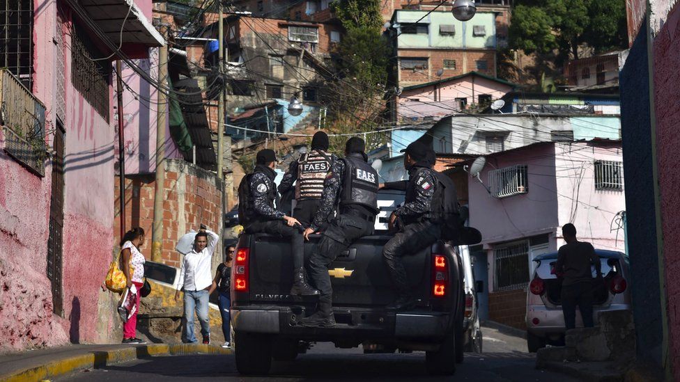 Members of Venezuela's Special Action Forces (FAES) carry out a security operation in Caracas