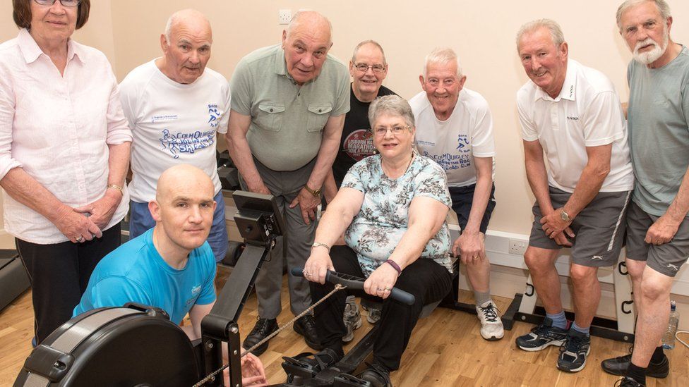 Ena Kerr with coach Davy Doherty from the project (blue T-shirt) and Mary Campbell, Tony Lynch, Phillip Crossan, John Hegarty, Trevor McNulty, David Canning and Pat Bell