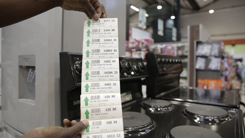 A list of new prices in Zimbabwe dollars for electrical products in a supermarket in Harare, Zimbabwe, 24 June 2019