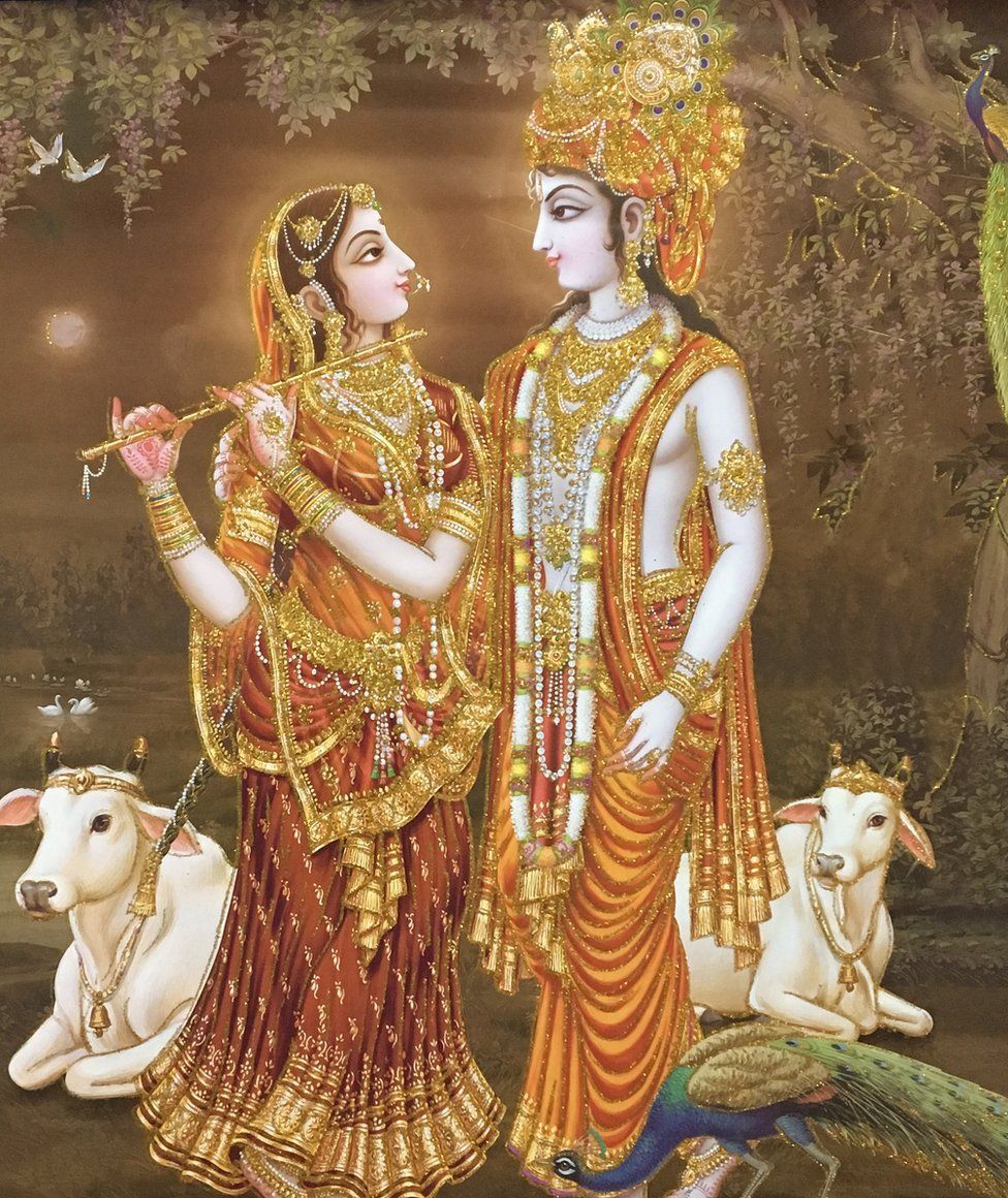 A calendar image of Hindu god Krishna with his consort Radha