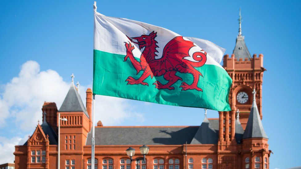 Welsh flag near Pierhead building in Cardiff Bay