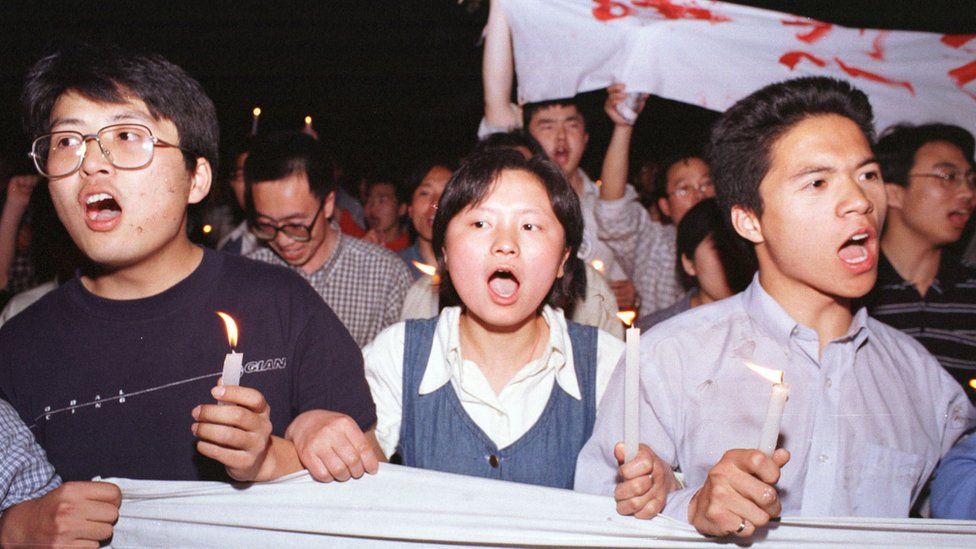 Chinese protestors march to the U.S. Embassy in Beijing May 9, 1999. Protests have erupted in a dozen or so major Chinese cities, drawing tens of thousands of angry citizens onto the streets. State media has fanned the fury by saying that the NATO bombing of the Chinese Embassy in Belgrade was a deliberate act of aggression