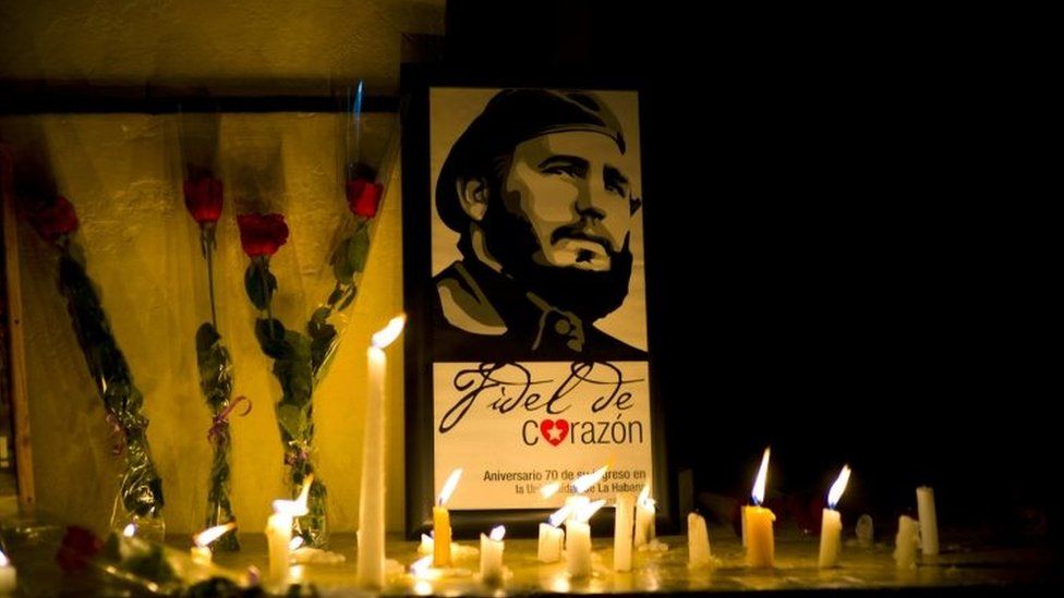 Candles and flowers around a picture of Fidel Castro in Havana. Photo: 26 November 2016