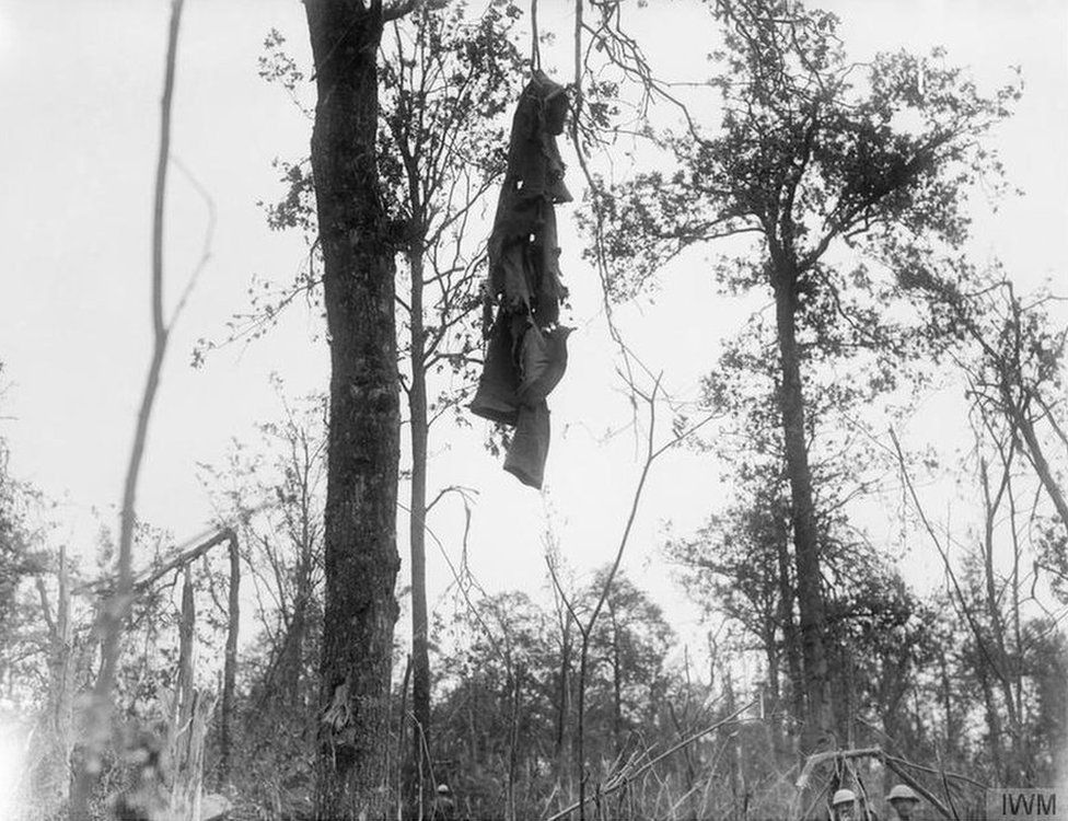 German soldier's overcoat, hanging from a tree in Mametz Wood, August 1916.