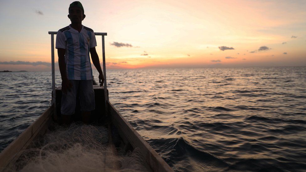 Abdul on fishing boat off the coast of Rote in Indonesia