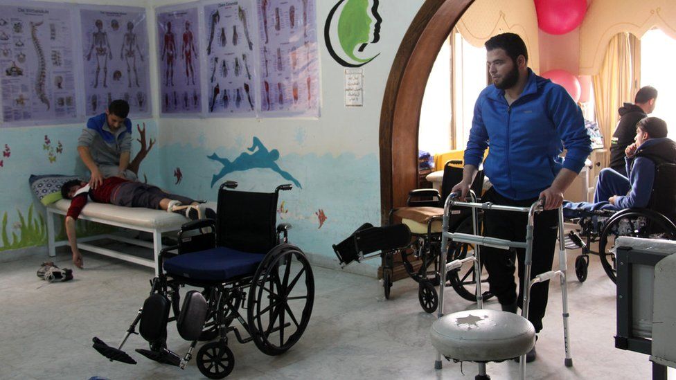 Injured Syrians at Souriyat Across Borders support centre in Amman