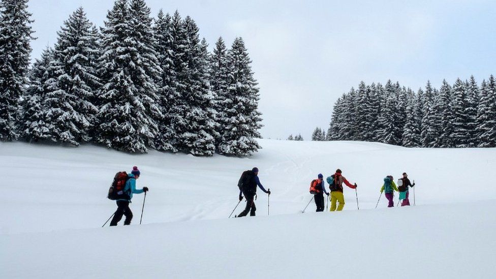 People on a ski touring trek in the Austrian Alps