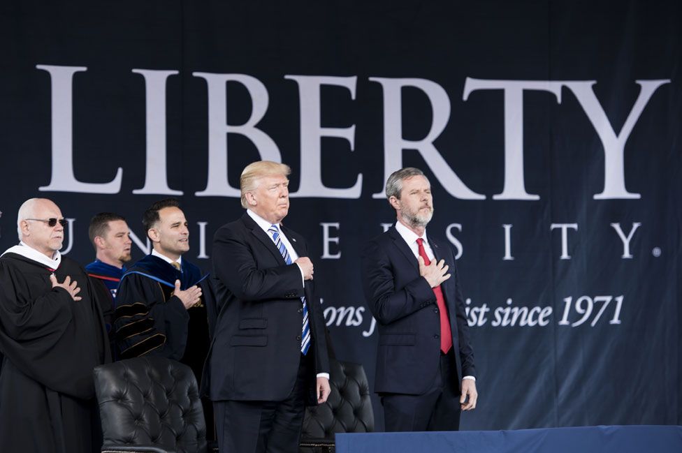 The president with Jerry Falwell Jr (right)