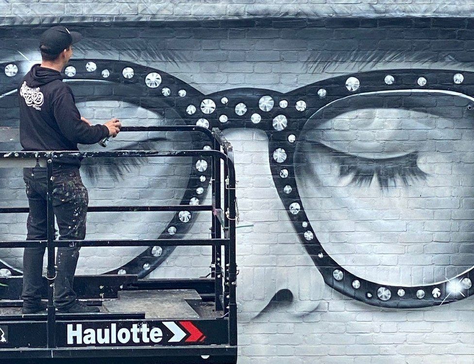 Mural of Sir Elton John on the side of Watford library