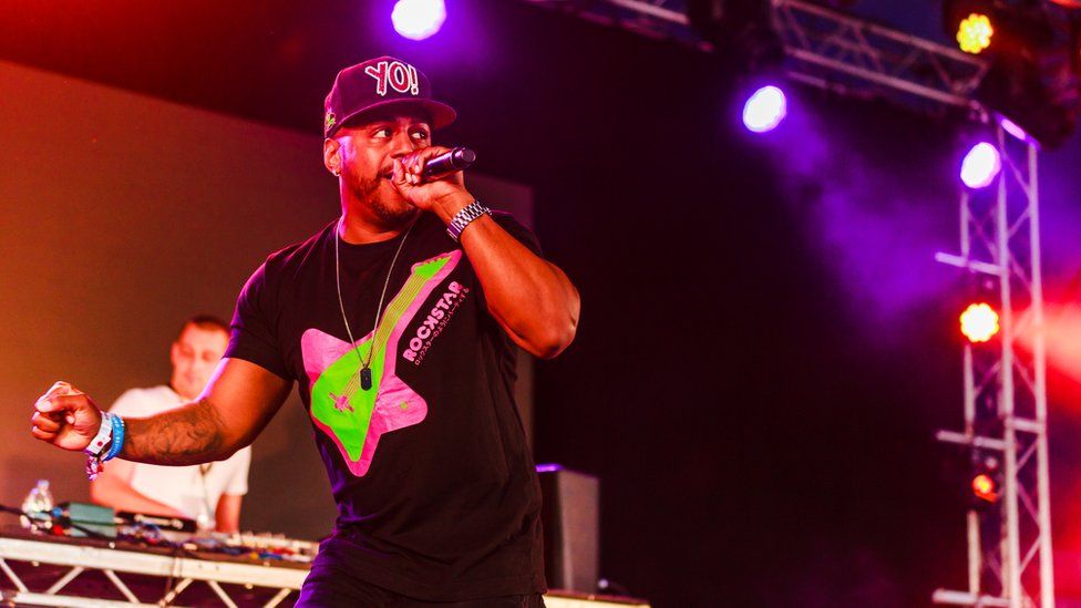 Bradley McIntosh from S Club Party on stage at Camp Bestival