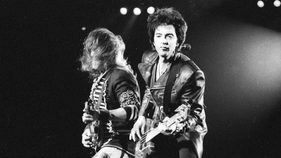 Richie Sambora and Alec John Such (facing) perform at the Target Center in Minneapolis, Minnesota on March 19, 1993.