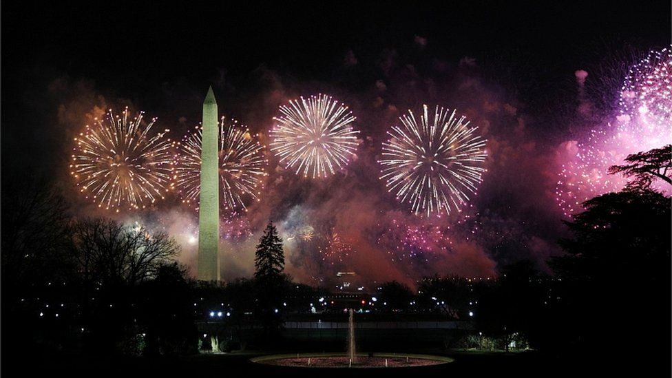 Fireworks burst over the Washington Monument during the "Celebrating America" event in Washington, DC., January 20, 2021