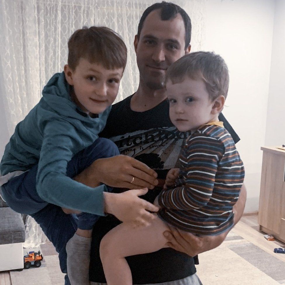 Oleh Halenda and his two children