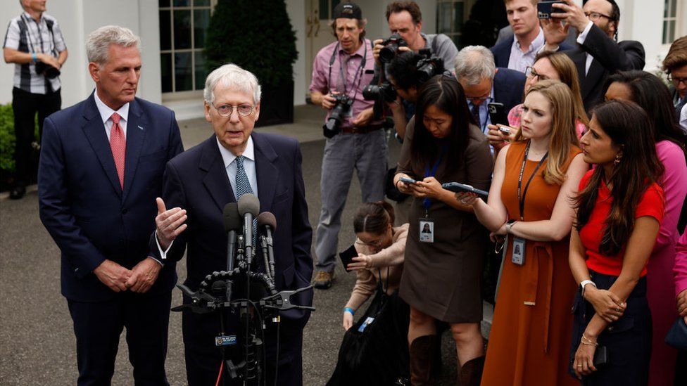 Speaker of the House Kevin McCarthy and Senate Minority Leader Mitch McConnell talk to reporters outside the West Wing after meeting with President Joe Biden and Vice President Kamala Harris about raising the debt limit.