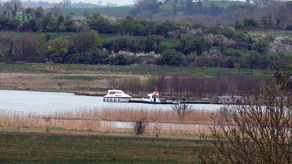 The boat moored at the rear of Devenish Island