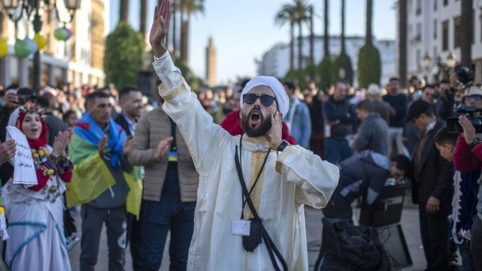 A man performs during celebrations on the eve of the 2973th Amazigh New Year, near the parliament in Rabat, Morocco, 13 January 2023. After more than eleven years of devoting Berbers as an official language alongside Arabic, voices in Morocco are increasingly calling for a public holiday to celebrate the Berber New Year.The term 'Yennayer' is also the name given to the first month of the Amazigh calendar.