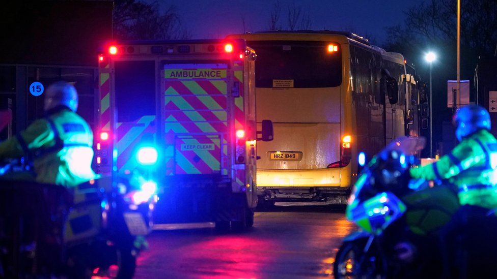 Coaches carrying the passengers arrived at Arrowe Park hospital, accompanied by police