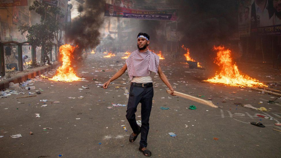 A Bangladesh Nationalist Party supporter participates in a protest demanding the resignation of Prime Minister Sheikh Hasina in Dhaka