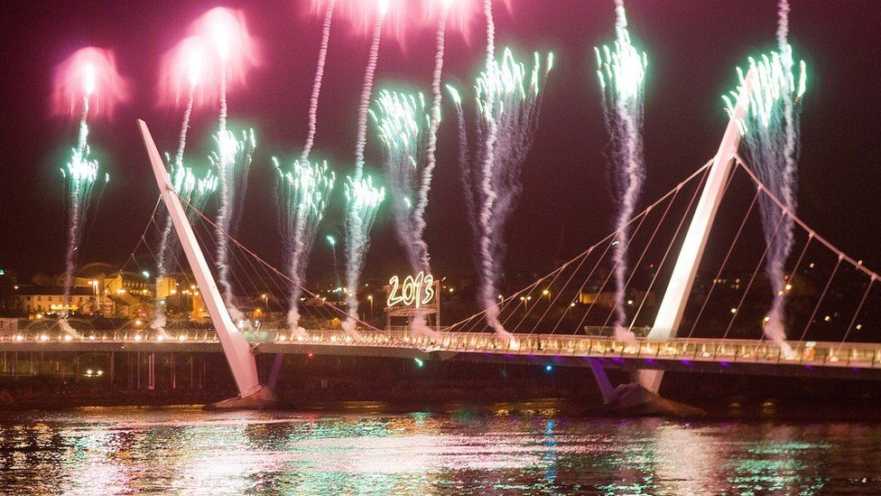 Fireworks over the Peace Bridge in Derry on New Years Eve 2013
