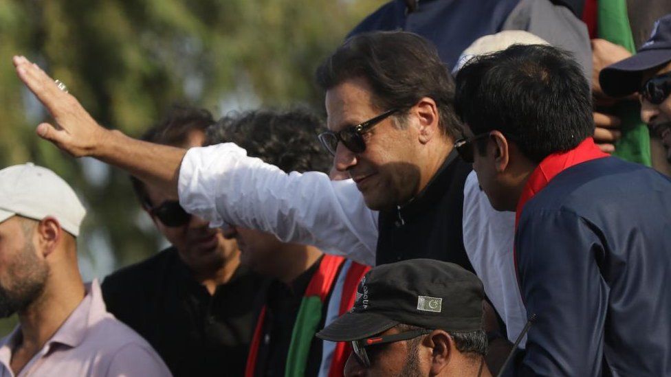 Pakistan's former Prime Minister and head of political party Pakistan Tehreek-e-Insaf (PTI) Imran Khan, gestures during a protest march towards Islamabad, in Gakhar, Pakistan, 02 November 2022
