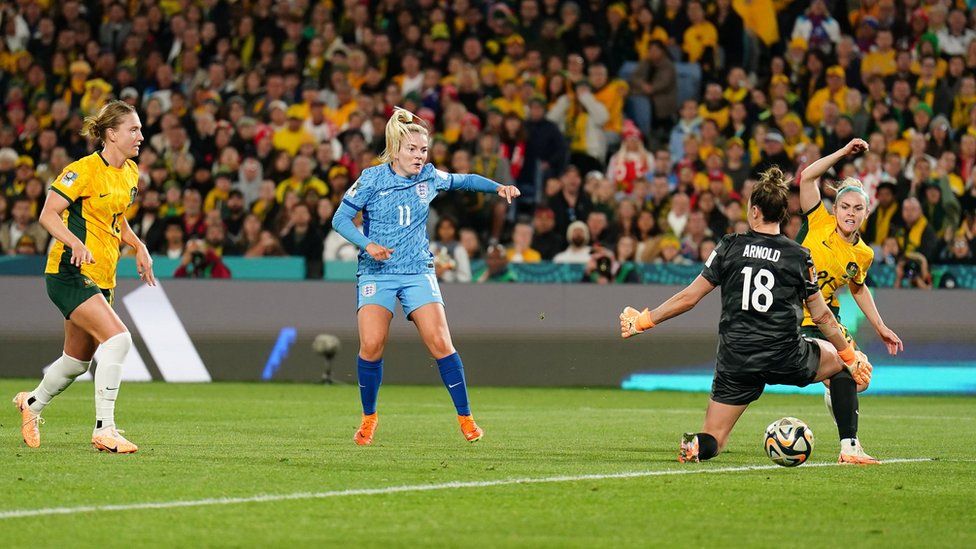 Lauren Hemp scores England's second goal against Australia