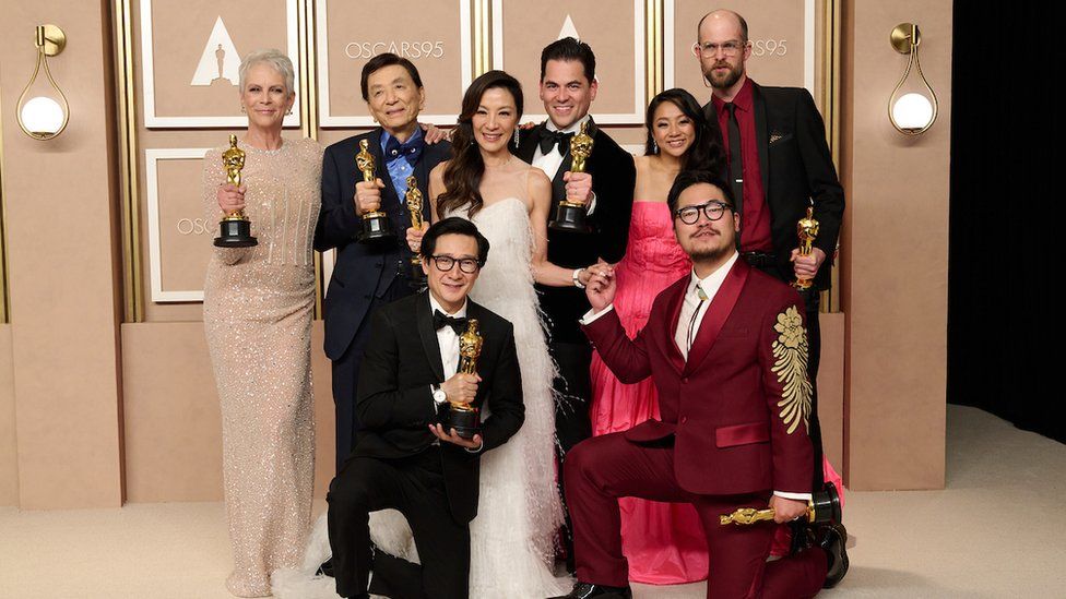 The Everything, Everywhere All at Once cast celebrating their wins at the Dolby Theatre