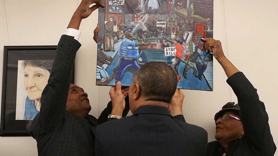 Democrats continued to re-hang the painting, as Republicans kept taking it down.