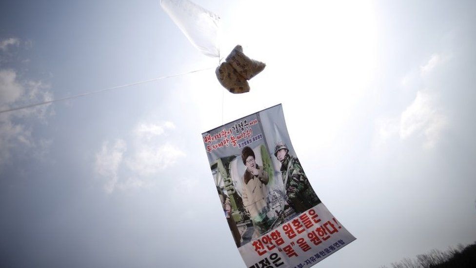 A balloon containing leaflets denouncing North Korean leader Kim Jong Un is seen near the demilitarized zone separating the two Koreas in Paju, South Korea
