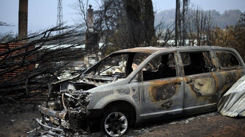 A burnt-out car from a bushfire in New South Wales